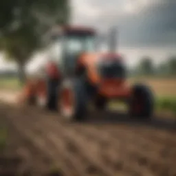 Compact small tractor in action plowing a field