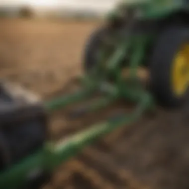 A farmer utilizing quick attach forks for loading tasks