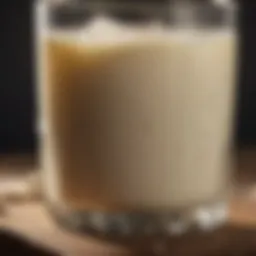 A glass of fresh raw milk showcasing its creamy texture