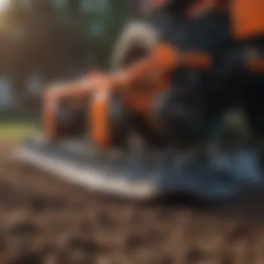 Close-up of rotary tiller blades working in soil