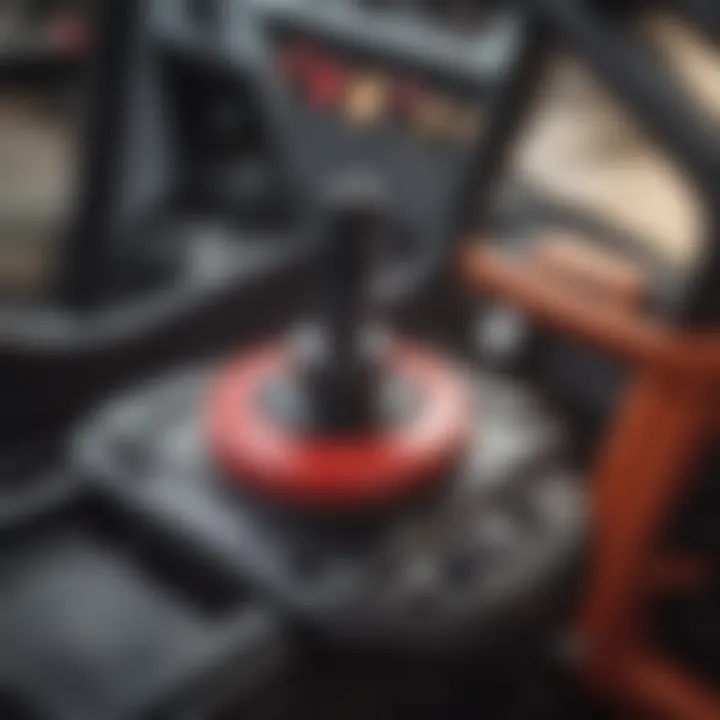 Close-up view of Mahindra tractor loader joystick highlighting its ergonomic design.