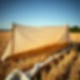 Durable thick tarp material in a field setting