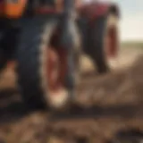 Tractor auger bit in action during soil drilling