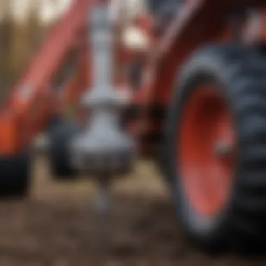 Maintenance routine being performed on a tractor auger bit