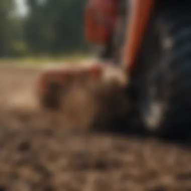 Close-up of soil being aerated by a rototiller